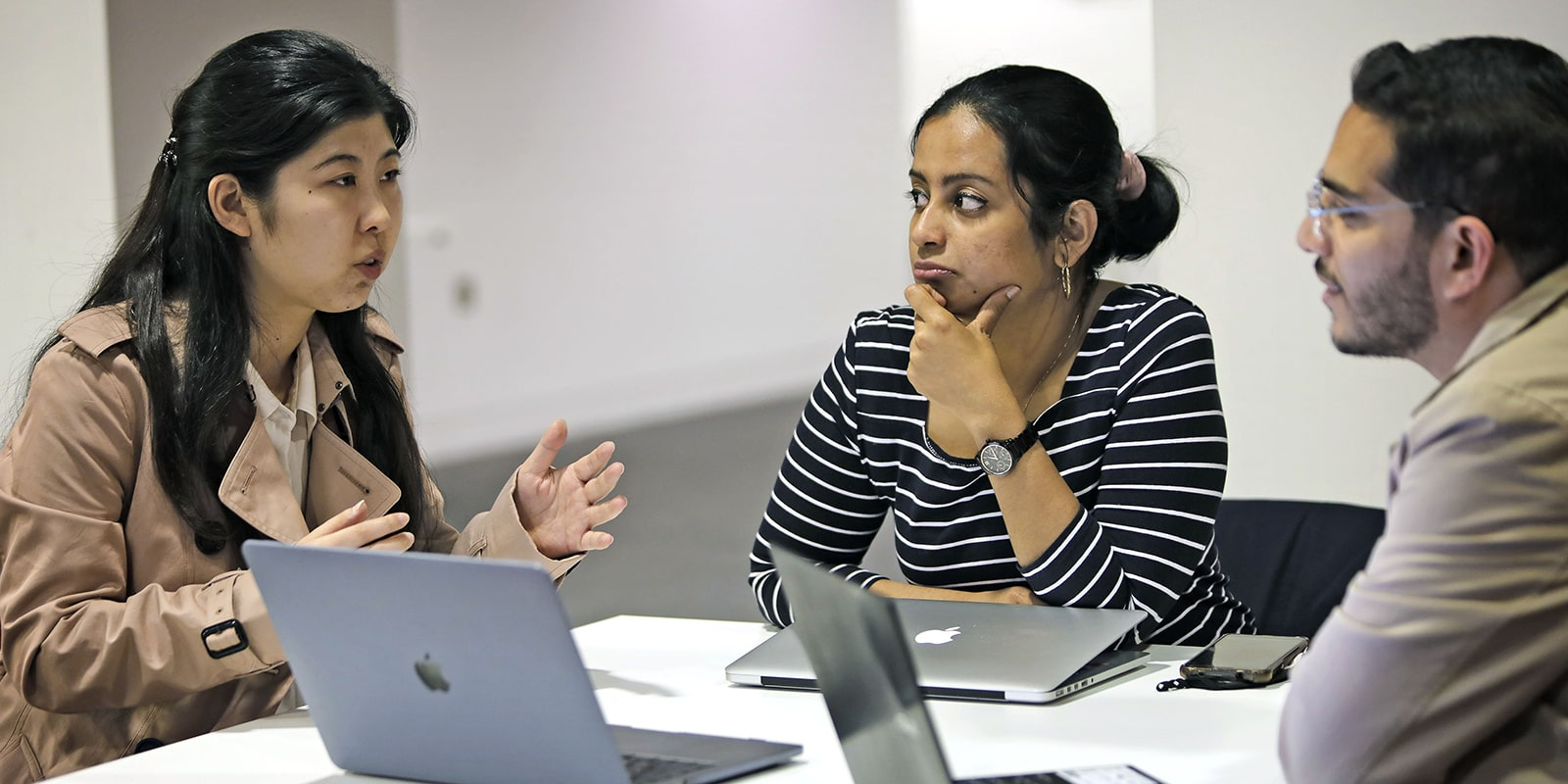 PhD students working together